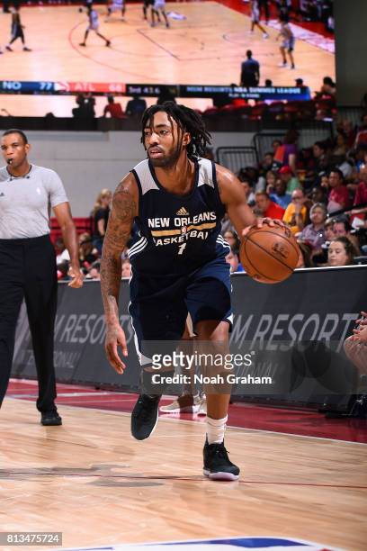 James Young of the New Orleans Pelicans handles the ball during the game against the Atlanta Hawks during the 2017 Las Vegas Summer League on July...