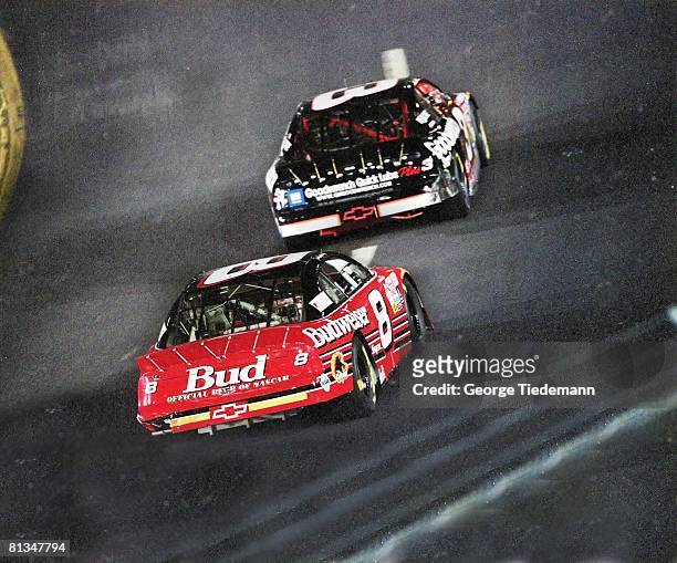 Auto Racing: NASCAR Exide Batteries 400, Dale Earnhardt Sr, in action vs son Dale Earnhardt Jr, , Richmond, VA 9/11/1999