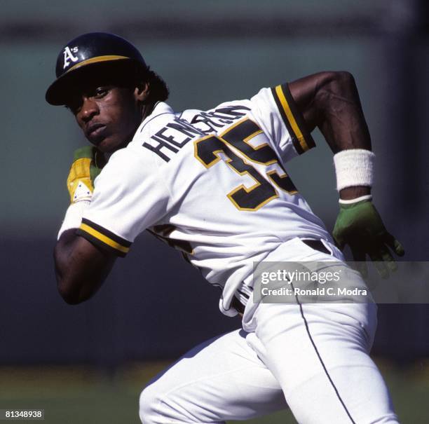 Rickey Henderson of the Oakland Athletics runs to second base in August 1982 in Oakland, California