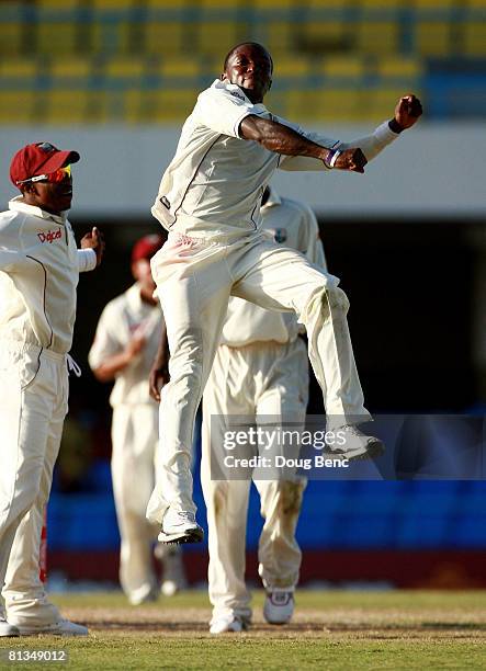 Fidel Edwards of West Indies celebrates after taking the wicket of Brett Lee of Australia on day four of the Second Test match between West Indies...