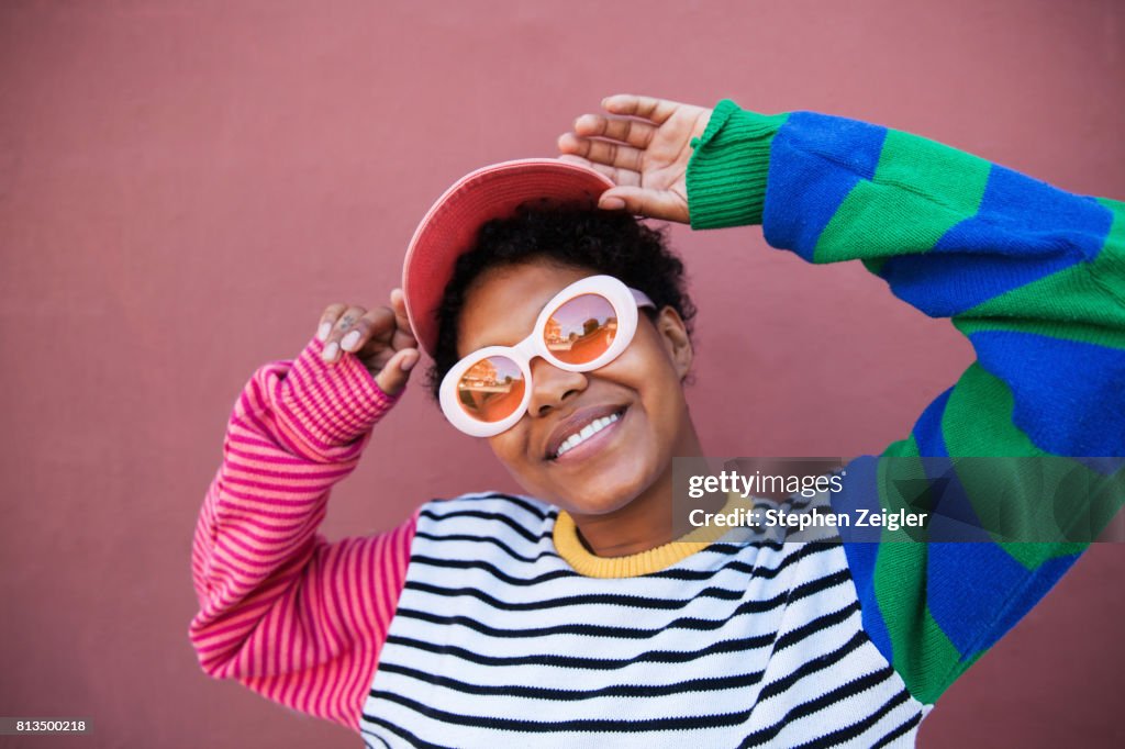 Portrait of young woman wearing sunglasses