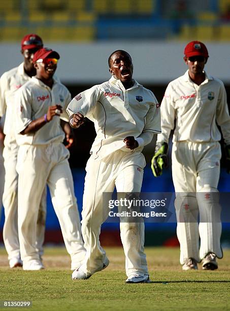 Fidel Edwards of West Indies celebrates after taking the wicket of Brett Lee of Australia during day four of the Second Test match between West...