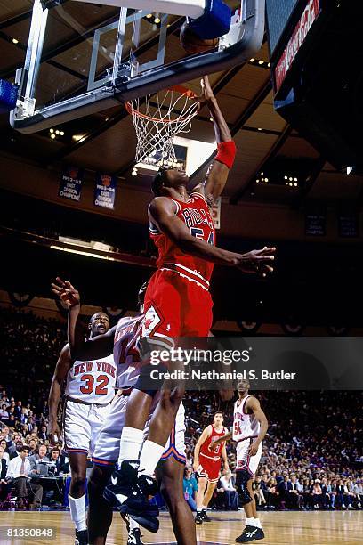 Horace Grant of the Chicago Bulls shoots a layup against Anthony Mason of the New York Knicks in Game Five of the Eastern Conference Semifinals...