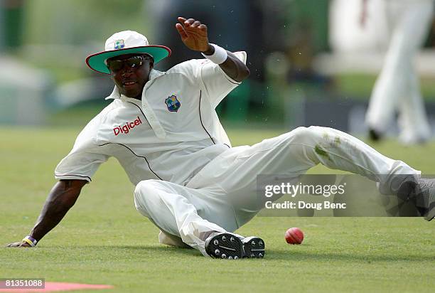Fidel Edwards of West Indies fields the ball during day four of the Second Test match between West Indies and Australia at Sir Vivian Richards...