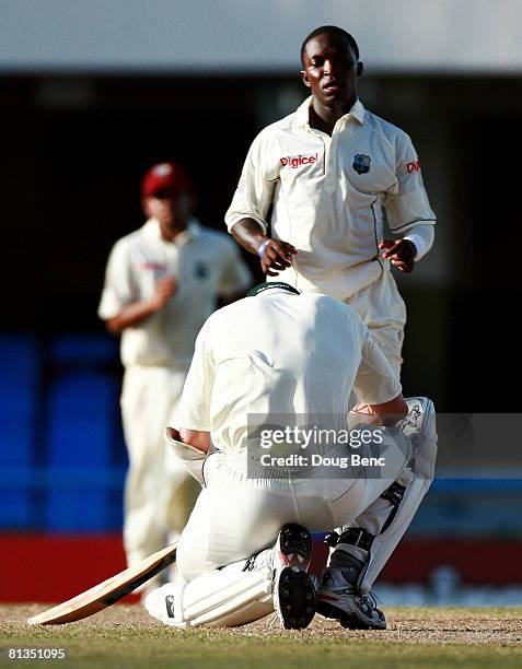 Fidel Edwards of West Indies runs to check on Brett Lee of Australia after hitting on the head with a bouncer during day four of the Second Test...