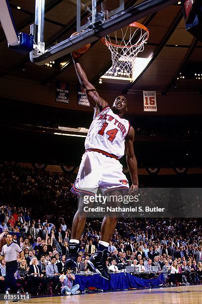 Anthony Mason of the New York Knicks dunks against the Chicago Bulls in Game Two of the Eastern Conference Semifinals during the 1994 NBA Playoffs at...