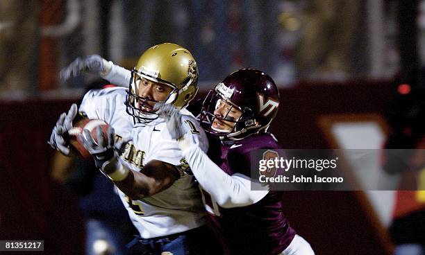 Coll, Football: Closeup of Pittsburgh's Larry Fitzgerald in action vs Virginia Tech's Vincent Fuller , Blacksburg, VA 11/2/2002