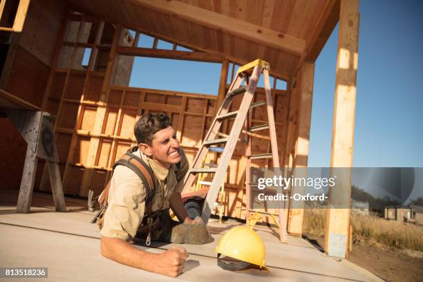 home building - injury - personal injury claim stock pictures, royalty-free photos & images