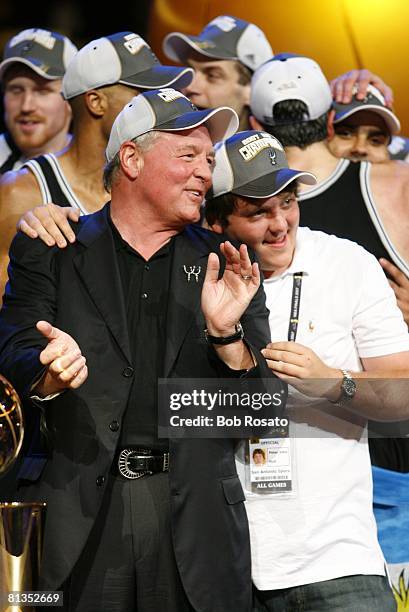 Basketball: NBA Finals, San Antonio Spurs owner Peter Holt victorious with son Peter John Holt after winning Game 4 and championship vs Cleveland...