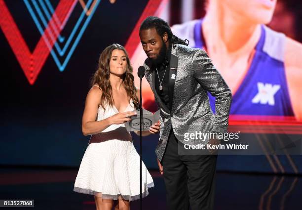 Race car driver Danica Patrick and Richard Sherman speak onstage at The 2017 ESPYS at Microsoft Theater on July 12, 2017 in Los Angeles, California.