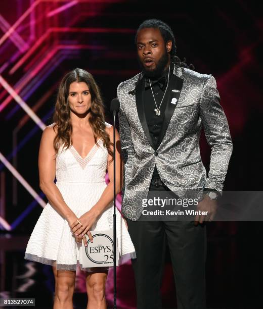 Race car driver Danica Patrick and Richard Sherman speak onstage at The 2017 ESPYS at Microsoft Theater on July 12, 2017 in Los Angeles, California.