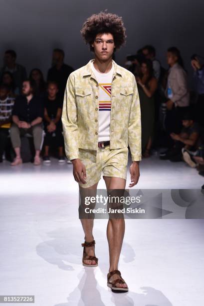 Model walks the runway at Parke & Ronen Fashion Show during NYFW Men's at Skylight Clarkson Sq on July 12, 2017 in New York City.