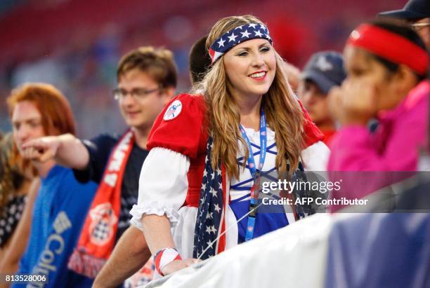 United States soccer fan awaits the start of Gold Cup Group B soccer match against Martinique on July 12, 2017 at Raymond James Stadium in Tampa,...