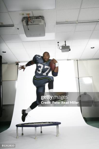 Football: Portrait of Seattle Seahawks Shaun Alexander jumping on trampoline during training camp at Seahawks Kirkland Headquarters, Kirkland, WA...