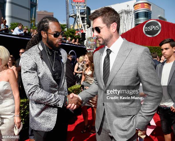Players Richard Sherman and Aaron Rodgers attend The 2017 ESPYS at Microsoft Theater on July 12, 2017 in Los Angeles, California.