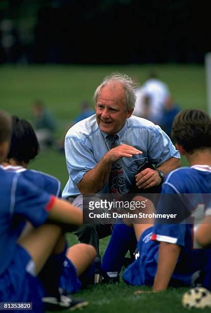 College Soccer: Connecticut College coach Ken Kline with team during game vs Amherst College, Amherst, MA 9/24/1994