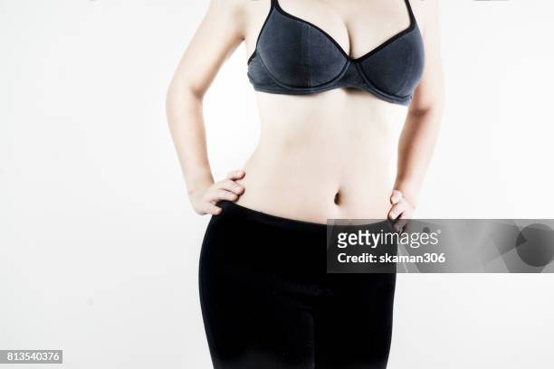 selective focus asian sporty girl and slim body shape with under sport wear - fat hips stock-fotos und bilder