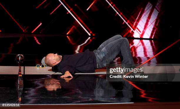 Player David Ross accepts the Best Moment award on behalf of the 2016 World Series champion Chicago Cubs onstage at The 2017 ESPYS at Microsoft...