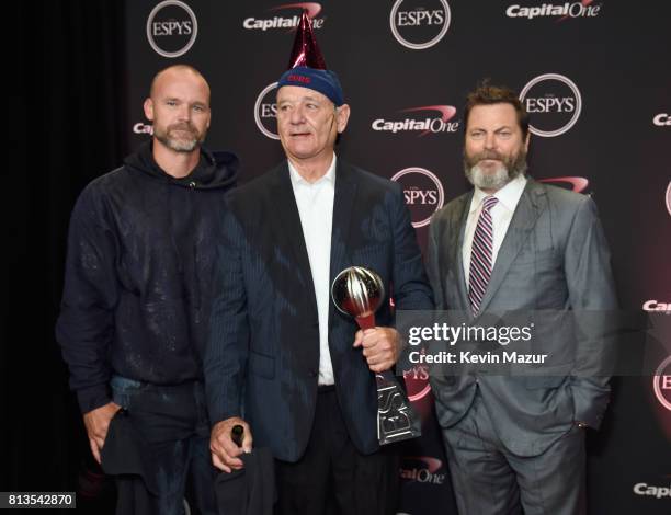 Player David Ross, actors Bill Murray and Nick Offerman pose with the Best Moment award on behalf of the 2016 World Series champion Chicago Cubs at...