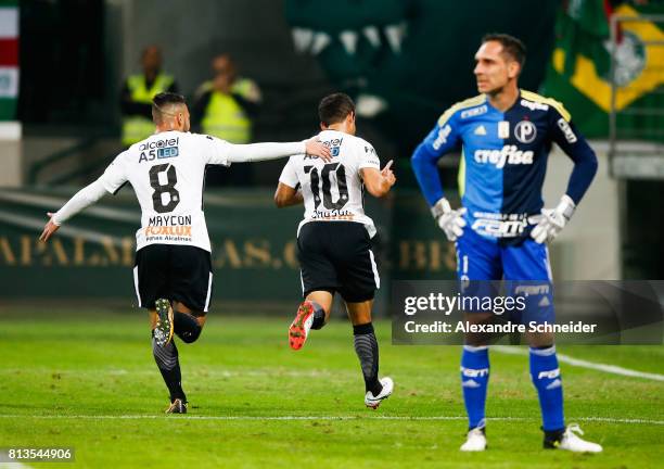 Jadson, #10 of Corinthians celebrates after scoring their first goal during the match between Palmeiras and Corinthians for the Brasileirao Series A...