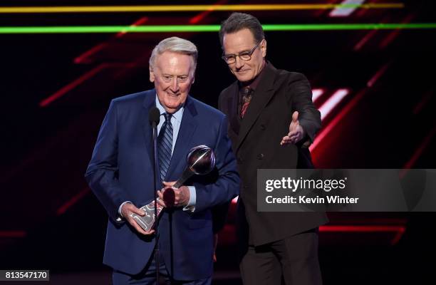 Sportscaster Vin Scully accepts the Icon Award from actor Bryan Cranston onstage at The 2017 ESPYS at Microsoft Theater on July 12, 2017 in Los...