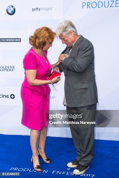 Juergen Prochnow and his wife Verena Wengler attend the Summer Party of the German Producers Alliance on July 12, 2017 in Berlin, Germany.