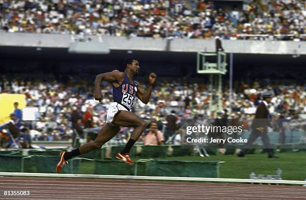Track & Field: 1968 Summer Olympics, USA John Carlos in action during 200M race, Mexico City, MEX --