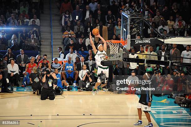 Basketball: NBA Slam Dunk Contest, Minnesota Timberwolves Gerald Green in action, making dunk and blowing out candle atop rim for "Birthday Cake"...