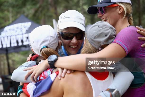 Michelle Payne hugs her support crew after finishing the STYR Labs Badwater 135 on July 12, 2017 in Death Valley, California. The start of the 135...