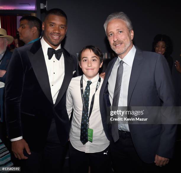 Player Russell Wilson, Nathan Stewart, and presenter Jon Stewart attend The 2017 ESPYS at Microsoft Theater on July 12, 2017 in Los Angeles,...