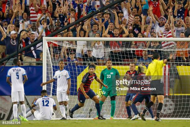 Omar Gonzalez United States celebrates his goal against Kvin Olimpa of Martinique during the second half of the CONCACAF Group B match at Raymond...