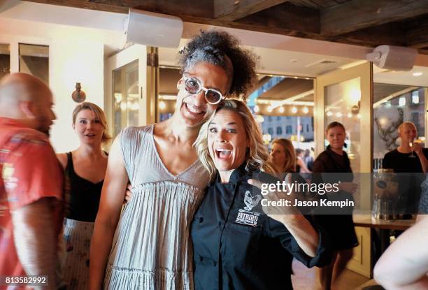 Chefs Carla Hall and Cat Cora attend the Grand Opening Of Fatbird Restaurant at Fatbird on July 12, 2017 in New York City.