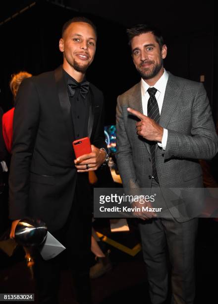 Player Steph Curry , winner of Best Team, and NFL player Aaron Rodgers, winner of Best Play and Best NFL Player, attend The 2017 ESPYS at Microsoft...