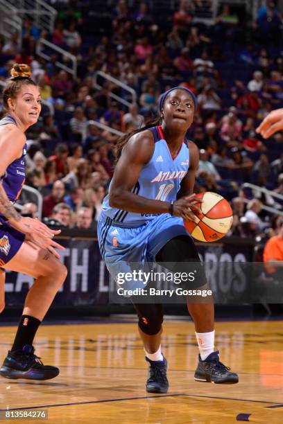 Matee Ajavon of the Atlanta Dream handles the ball against the Phoenix Mercury on July 12, 2017 at Talking Stick Resort Arena in Phoenix, Arizona....