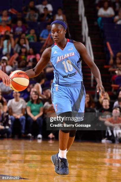 Matee Ajavon of the Atlanta Dream handles the ball against the Phoenix Mercury on July 12, 2017 at Talking Stick Resort Arena in Phoenix, Arizona....