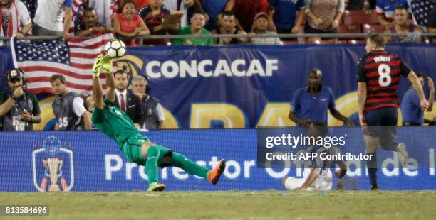 United States forward Jordan Morris has a shot on goal saved by goalkeeper Kevin Olimpa of Martinique during the second half of their Group B Gold...