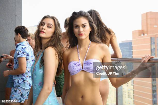 Models pose backstage at Thorsun Men's and Women's Spring/Summer 2018 presentation on July 12, 2017 in New York City.