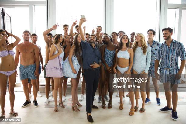 Thorsun designer George Sotelo and models pose before the start of the Thorsun Men's and Women's Spring/Summer 2018 presentation on July 12, 2017 in...