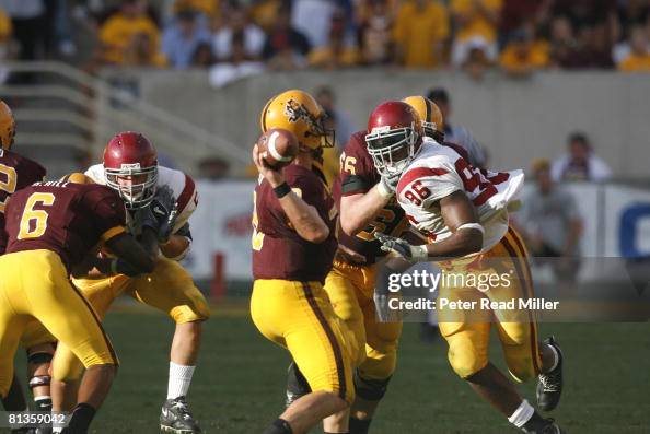 Rear view of Arizona State QB Sam Keller in action, making under ...