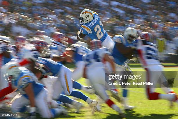 Football: San Diego Chargers LaDainian Tomlinson in action, diving and scoring touchdown vs Buffalo Bills, Blur, San Diego, CA