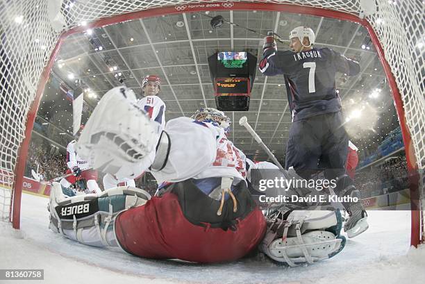 Hockey: 2006 Winter Olympics, Goal view of Russia goalie Maxim Sokolov in action, yielding goal vs USA Keith Tkachuk during Preliminary Round - Group...