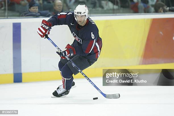 Hockey: 2006 Winter Olympics, USA Bret Hedican in action vs Russia during Preliminary Round - Group B game at Palasport Olimpico, Turin, Italy...