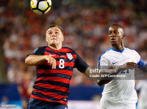 United States forward Jordan Morris controls the ball ahead of Martinique defender Sebastien Cretinoir during their Group B Gold Cup soccer game on...
