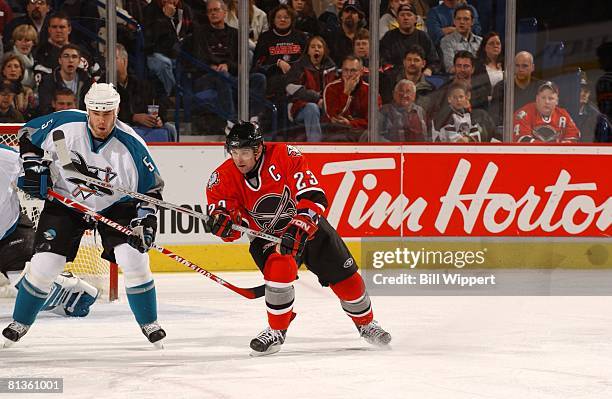 Hockey: Buffalo Sabres Chris Drury in action vs San Jose Sharks Rob Davison , Buffalo, NY 12/2/2005