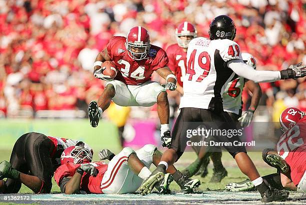 College Football: Cotton Bowl, Alabama Kenneth Darby in action, jumping vs Texas Tech, Dallas, TX 1/2/2006