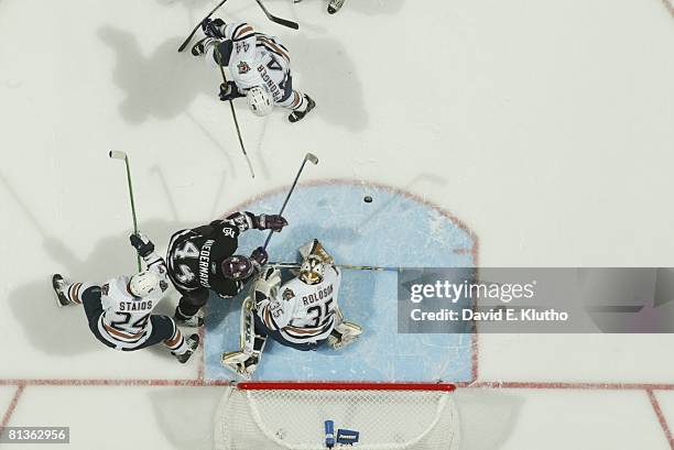 Hockey: NHL Playoffs, Aerial view of Anaheim Mighty Ducks Rob Niedermayer in action vs Edmonton Oilers goalie Dwayne Roloson , Steve Staios , and...