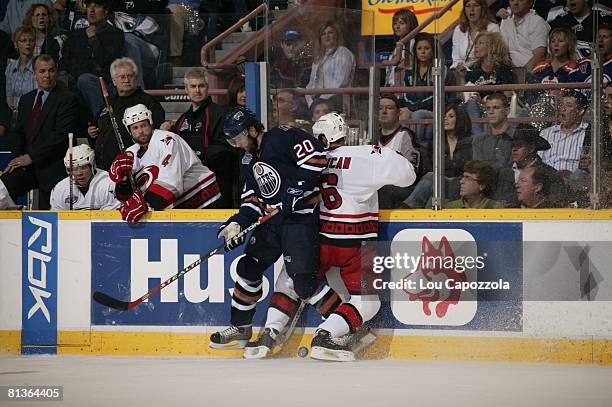 Hockey: NHL Finals, Edmonton Oilers Radek Dvorak in action, check vs Carolina Hurricanes Bret Hedican , Game 6, Edmonton, Canada 6/17/2006