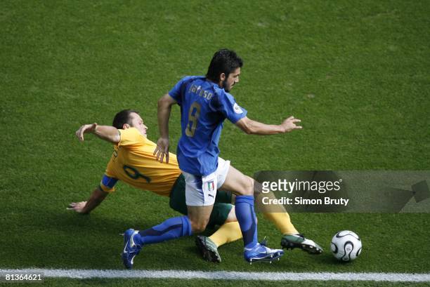 Soccer: World Cup, Italy Gennaro Gattuso in action during slide tackle vs Australia Mark Viduka , Round of 16, Kaiserslautern, Germany 6/26/2006