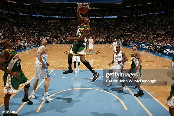 Basketball: Seattle SuperSonics Chris Wilcox in action, making dunk vs Denver Nuggets, Denver, CO