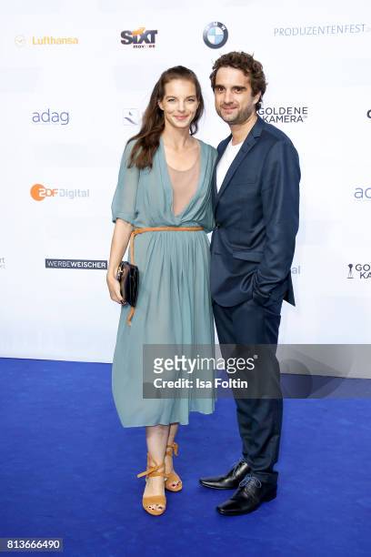 German singer Yvonne Catterfeld and her husband German actor Oliver Wnuk attend the summer party 2017 of the German Producers Alliance on July 12,...